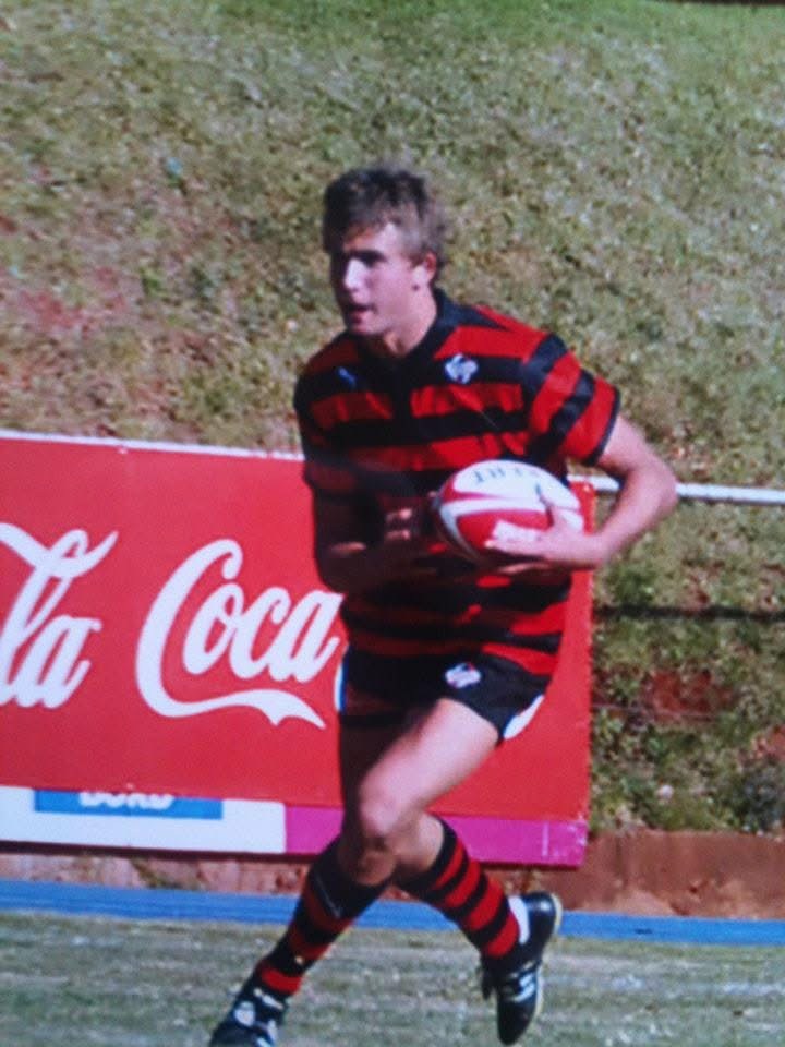A young Jérémy Ward running with the ball